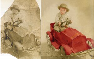 Boy in red toy car